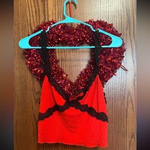 Red with black lace tank top, straps not adjustable size L.